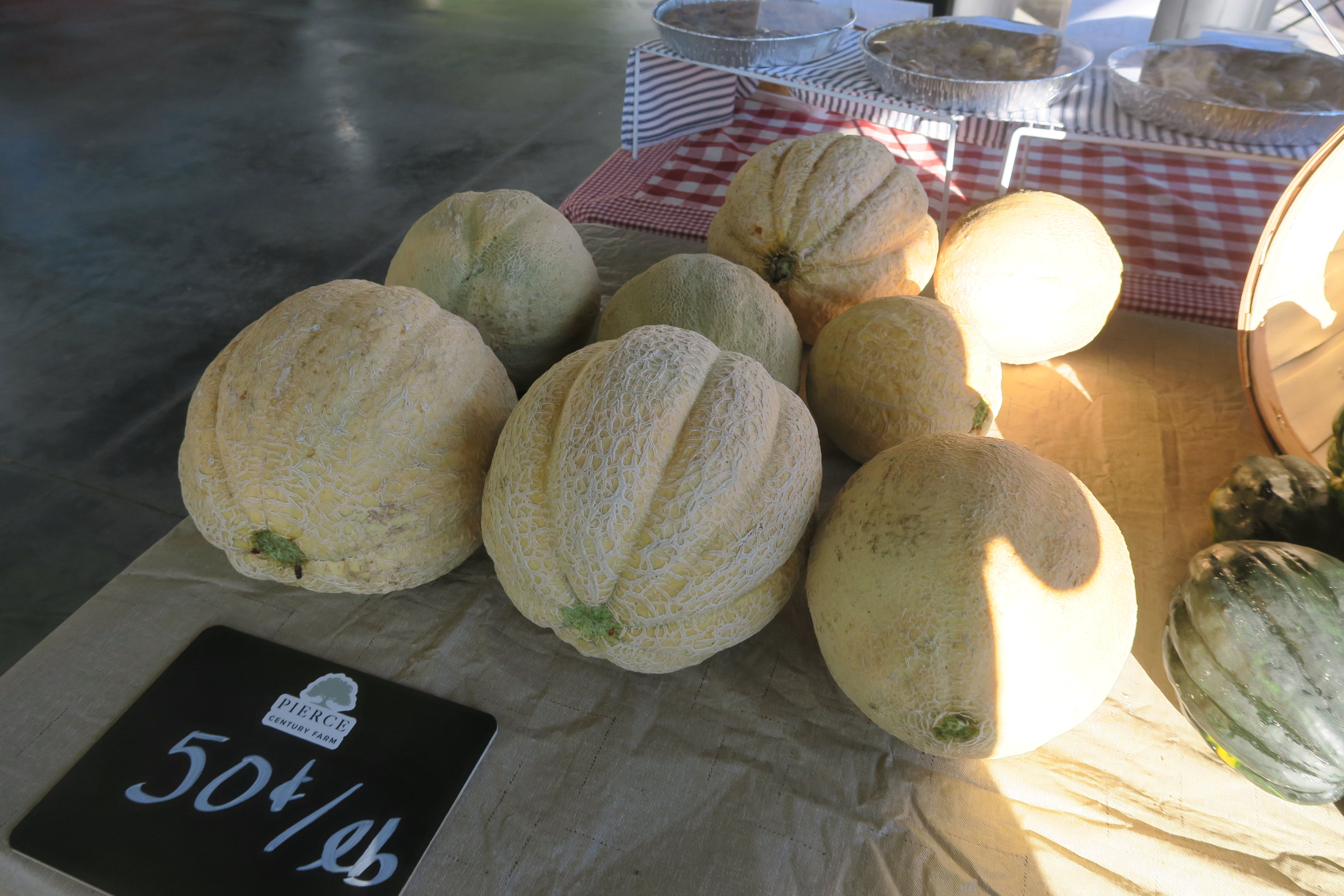 Vendors and visitors at the De Soto Farmers Market